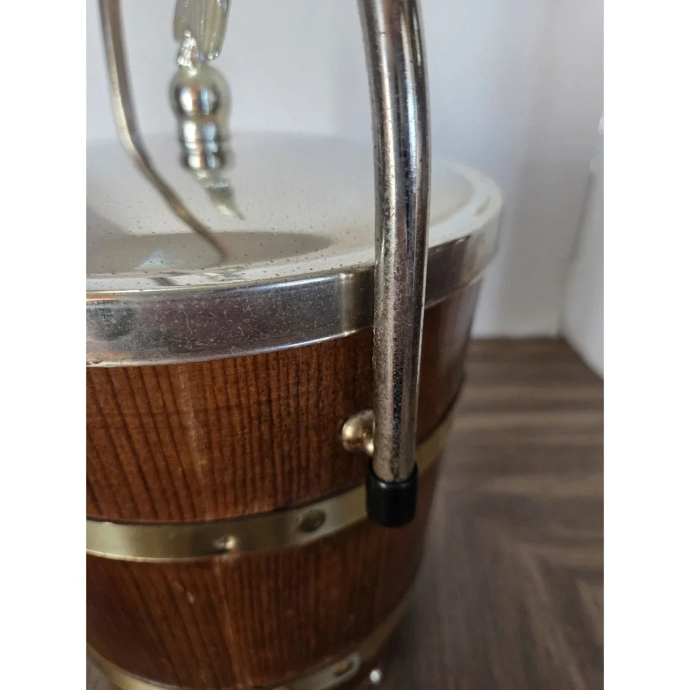 vintage Jerywil wood and brass-accented footed ice bucket from the 1970s